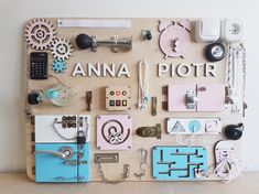 an assortment of assorted items displayed on a wooden board that says anna picr