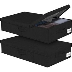 two black storage boxes with lids open and clothes in the bottom one is folded up