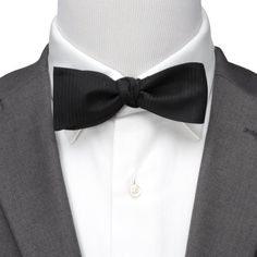 Show up to your black tie event with confidence with this black formal pinstripe bow tie. This black formal bow tie is made with 100% silk. Classic Black Tie Event Bow Tie, Black Dapper Suit And Tie Accessories For Business, Classic Black Tie With Decorative Bow, Tuxedo Accessories For Black-tie Events, Including Bow Tie, Dapper Bow Tie Back Ties For Black-tie Events, Classic Bow Ties For Black-tie Events, Tuxedo Style Bow Tie For Black-tie Events, Elegant Black Tuxedo For Black Tie, Tuxedo Style Suit And Tie Accessories For Black-tie Events