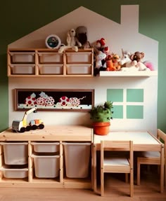 there is a toy kitchen with toys on the counter and shelves in front of it