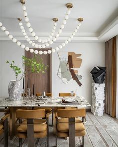 an elegant dining room with marble table and chairs