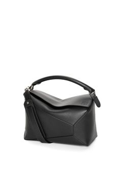 [vc_row][vc_column width=”1/3″][vc_column_text text_larger=”no”] LOEWE LOEWE Puzzle bag in classic calfskin The Puzzle bag is the debut bag for LOEWE by Small Puzzle Bag, Cuboid Shape, Loewe Puzzle Bag, Denim Wallet, Loewe Puzzle, Jonathan Anderson, Puzzle Bag, Loewe Bag, Large Wallet