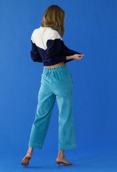 The Pietro Pant in Cornflower is a corduroy, straight-leg pant. It features a button fly closure and elastic at the back waistband. Two side seam pockets. Made in Los Angeles Fit: True to Size Materials: 48% Polyester 32% Cotton 19% Rayon 1% Elastane Size: XS-XL Model wears size small. ﻿Sale items are final sale and cannot be returned or exchanged. Ciao Lucia, Knit Alpaca, Baby Alpaca, Knit Pullover, Knitted Pullover Sweaters, Knitted Pullover, Straight Leg Pants, A A, Black Sweaters