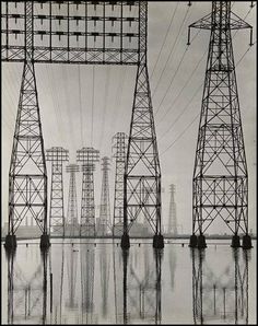 an old photo of power lines in the water with reflections on the water below them