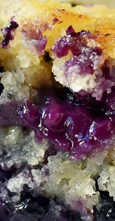 closeup of a piece of blueberry cobbler with crumbs on it