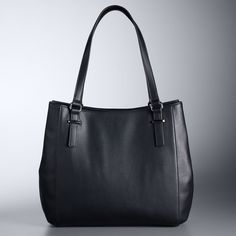 Carry around your personal effects in style with this faux leather tote bag from Simply Vera Vera Wang.Carry around your personal effects in style with this faux leather tote bag from Simply Vera Vera Wang. How do you accessorize? Check out our ACCESSORIES GUIDE for essential tips to elevate your style with must-have accessories.DETAILS Tote silhouette 11.5"H x 15.75"W x 6.8"D Handle length: 10 in. Zipper closure, magnetic snap closure Interior: 2 slip pockets, 1 zip pocket Gunmetal finish hardw Faux Leather Shoulder Bag With Leather Handles For Work, Faux Leather Tote Satchel For Work, Faux Leather Work Bags With Removable Pouch, Faux Leather Tote Bag For Work, Double Handle Faux Leather Satchel For Work, Classic Faux Leather Work Bag, Faux Leather Satchel Bag For Work, Vera Wang Collection, Simply Vera Wang