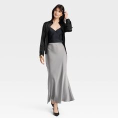 Dress up for brunches, lunches or dinners in chic style with this Maxi Slip Skirt from A New Day™. This maxi-length slip skirt is made from lightweight satin fabric for all-day comfort, while the full elastic waistband lends a secure fit. Tailored in a high-rise silhouette with a slim fit for a flattering look, you can pair this skirt with your fave tops and footwear for versatile ensembles. A New Day™: Style that goes wherever you do. Maxi Slip Skirt, Midi Sweater Skirt, Slip Skirt, Satin Color, Satin Maxi, Womens Tie, Women Maxi, Polyester Dress, Casual Fall Outfits