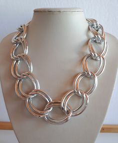 chic STATEMENT silver tone metal chain necklace choker with enormous double flattened links and big clasp. 20 inches; individual links 1.5 x 1 x 1 x 1/8 inches.  Gorgeous !   very good condition  To make this a smooth and pleasant transaction experience for everyone, all buyers need to read and understand the description, the terms of sale , the payment and the shipping indicated in this listing. Return not accepted - please ask before purchase. Thank you for watching my other items! A large col Metal Chain Necklace, Necklace Choker, Metal Chain, Chains Necklace, Choker Necklace, Silver Tone, Chain Necklace, Jewelry Necklaces, Bathing Beauties