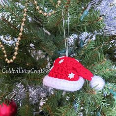 a christmas ornament hanging from a tree