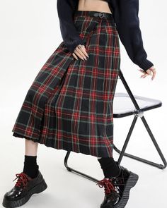 This black and red plaid midi skirt comes with a high-waist design and bold, layered pleats. Ideal for a preppy aesthetic, it adds an modern twist to any wardrobe. Size:• S: Waist: 66cm/ 26.0 in, Length: 78cm/ 30.7 in• M: Waist: 70cm/ 27.6 in, Length: 79.5cm/ 31.3 in• L: Waist: 74cm/ 29.1 in, Length: 81cm/ 31.9 inMaterial: Polyester Red Pleated Bottoms For Winter, Trendy Plaid Skirt For Winter, Trendy Pleated Plaid Bottoms, Casual Pleated Skirt For Winter, Black Casual Pleated Skirt For Fall, Preppy Pleated Skirt For Winter, Casual Full Pleated Skirt For Winter, Trendy Plaid Skirt For Fall, Casual Plaid Skirt For Work