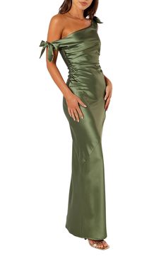 This glamorous bow-trimmed gown is crafted from glossy satin and designed in a sweet shoulder-baring silhouette. Hidden side-zip closure One-shoulder neck Unlined 98% polyester, 2% spandex Hand wash, dry flat Imported Pink Silky Dress, Debbie Downer, Shoulder Off, Long Evening Dress, Graduation Dresses, Bow Dress, Satin Gown, Dress Bridesmaid, Satin Bow