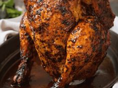 a close up of a cooked chicken on a plate