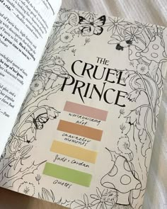 the cruel prince book is open on a bed