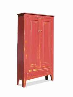 a red cabinet with two doors and legs