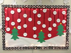 a bulletin board decorated with christmas trees and snowflakes on it's sides