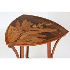 a wooden table with floral designs on it