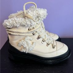 Authentic Chanel Ivory Leather Ankle Boots Lace Up Size 37 It Chanel Leather Ankle Hiking Boots From The 2020 Collection Ivory Cream Interlocking Cc Logo Rubber & Shearling Trim Round-Toes Wrap-Around Straps & Lace-Up Closure At Uppers Condition Is Excellent,Some Creasing Wear At Bottom Soles And Rubber Trim Heels: 1.25" Serial #: G36824 Size 37 It No Dust Bags ,No Box They Are Faux Fur Lined Inside,Please Consider That So That They Do Runs Smaller Because Of Fur Lined Thank You Chanel Cc Cream, Ankle Boots Lace, Shopping Chanel, Boots Ankle, Cc Logo, Chanel Shoes, Lace Boots, Leather Ankle Boots, Boot Shoes Women