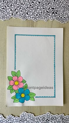 a piece of paper with flowers on it and lace trimming around the edges,