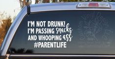 a car with the words i'm not drunk, i'm passing snacks and whooping $ 699 per life