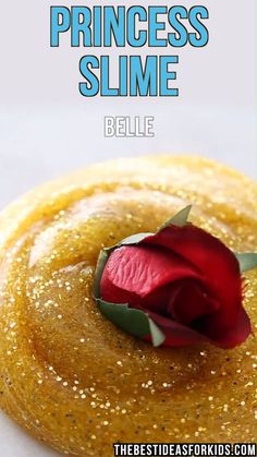 a close up of a pastry with a rose on top and the words princess slime below it