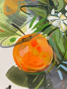 a painting of an orange and some flowers