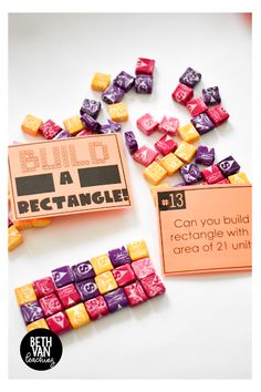 the game is being played with colorful dices and an orange sign that says girl befrance