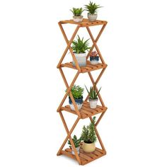 three tier bamboo plant stand with potted plants on top and bottom shelf, in front of a white background