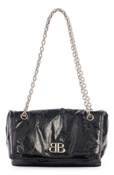 Richly textured leather elevates a roomy shoulder bag designed with back-to-back BB hardware and a silvertone pull-through chain strap. Flap closure Pull-through chain strap Leather Made in Italy Designer Handbags Black Silver Handbag, Balenciaga Lindsay Bag, Balenciaga Diamond Bag, Balenciaga Piercing Bag, Purse Balenciaga, Balenciaga Crossbody Bag, Balenciaga Bag Strap, Balenciaga Silver Clutch, Balenciaga Metallic Purse