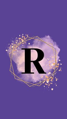 the letter r is surrounded by gold and white sprinkles on a purple background