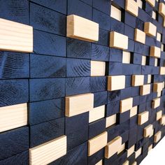 wood blocks are arranged on the wall