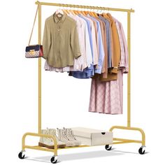 a clothing rack with clothes hanging on it