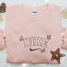 The Butterfly x Nike Animal Embroidered Shirt is a custom masterpiece that combines the elegance of butterflies with the iconic Nike Embroidered Sweatshirt, Nike Cartoon, Nike Inspired, Best Family Gifts, Maroon Hoodie, Embroidered Shirts, Custom Nike, Shirt Nike, Nike Brand