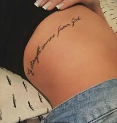 a woman's stomach with the words, you are my mom got written on it