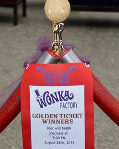 there is a sign on the back of a fire hydrant that says wonka factory