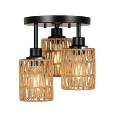 three lights that are on top of a ceiling fixture with wicker baskets hanging from the ceiling