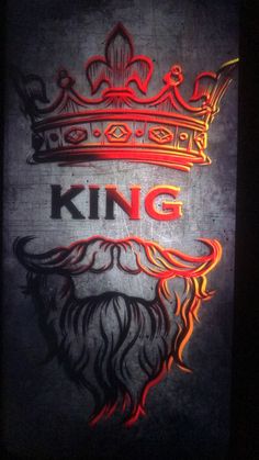 a sign that says king with a crown on it's head and beards