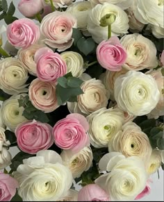 a large bouquet of pink and white flowers