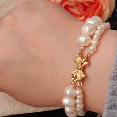 Next day shipping The double-layer pearl bracelet is composed of a string of 8MM Baroque pearls and a string of 4.6MM pearls. The design is novel and exquisite. It is a very happy pearl bracelet. All images are copyrighted by TTANGADGETS . All rights reserved  View more items in my shop      https://www.etsy.com/shop/TTanGadgets Pearl Bead Bracelet, Jade Necklace, Minimalist Bracelet, String Bracelet, Pearl Shell, Cat Earrings, Baroque Pearls, Bead Bracelet, Pearl Bracelet