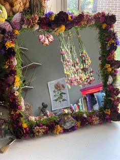 a mirror that has flowers on it