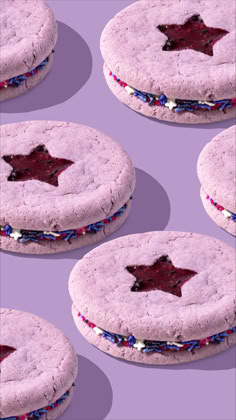 several cookies with red, white and blue icing on them are arranged in the shape of a star