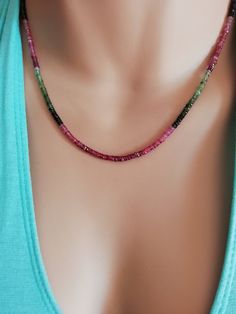 black tourmaline necklace gold october birthstone green tourmaline choker necklace for women tourmaline jewelry october birthday pink tourma This necklace is a gorgeous tourmaline strand! The tourmaline gemstones are faceted which means that they reflect the light and thus they give a dainty sparkling touch to the necklace and your look! The torumalines are black, green, pink, and some yellowish! Beautiful colors that form an elegant rainbow! This necklace is a statement necklace so you don't ne Adjustable Tourmaline Gemstone Necklace, Gemstone Beads Jewelry For May Birthstone, Dainty Tourmaline Gemstone Beads Jewelry, Dainty Tourmaline Gemstone Jewelry, Round Tourmaline Jewelry Gift, Elegant Adjustable Tourmaline Necklace, Adjustable Tourmaline Gemstone Beads Jewelry, Elegant Single Strand Tourmaline Jewelry, Tourmaline May Birthstone Jewelry