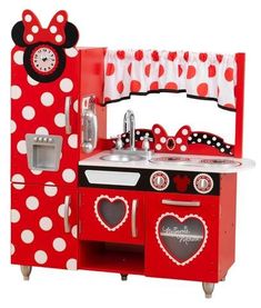 a red and white toy kitchen with minnie mouse