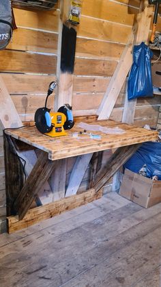 a work bench made out of wooden boards