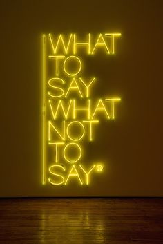 a neon sign that reads what to say what not to say