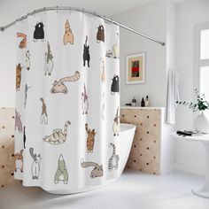 a shower curtain with cats all over it