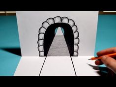 someone is drawing an image with pencils on paper