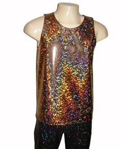 "Get your sparkle on with this fun flashy tank top cut for a man. Made from high quality stretch holographic material. This listing is for the Gold color shown in the first 3 photos. Shown with black joggers. Also available in Black, Silver, White and Rainbow. Please find more colors here: https://www.etsy.com/shop/DancingTreeCreations?ref=seller-platform-mcnav Sizes XSmall-XLarge If in doubt, order down a size. Actual Chest measurement ... Length from shoulder to hem, tall length is 3\" longer Edc Festival, Holographic Material, Holographic Fabric, Mens Tank, Black Joggers, Measurement Length, White Fabrics, Black Leggings, Mens Tank Tops