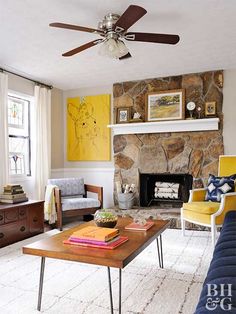 a living room filled with furniture and a fire place