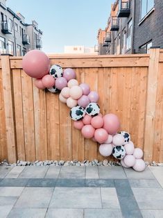 some balloons are in the shape of a letter