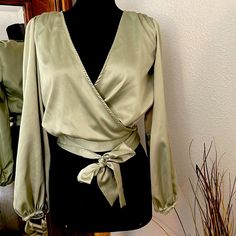 Kendall & Kylie Cross Body Blouse, Olive Green And Very Silky Soft. Size Xs. There Is A Zipper On The Left Side For A Snug Fit. The Scrunched Up Detail On The Shoulders Is Super Cute And Adds To The Character Of The Top. Nwt. Chic Green Wrap Top, Chic Green Wrap Top For Spring, Chic Green Wrap Blouse, Solid Color Chic Wrap Tops, Chic Olive Long Sleeve Tops, Elegant Wrap Top In Solid Color, Long Sleeve Wrap Top For Night Out In Spring, Long Sleeve Wrap Top For Spring Night Out, Long Sleeve Wrap Top For Spring Party